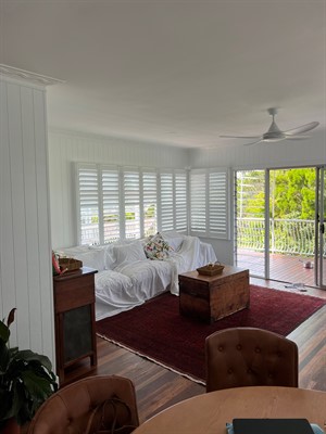 Image of Infinity Shutters with Large Face-Fit Frame Installed Over Awning Windows